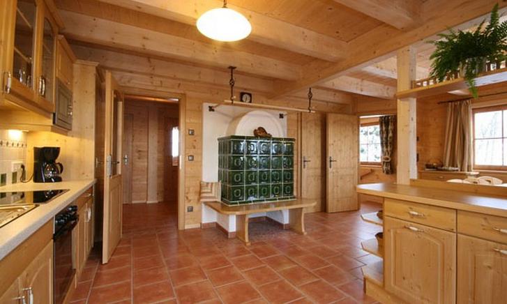 Ferienhaus Österreich Aich 10 Personen - Wohnbereich mit behaglichem Kachelofen Ferienhaus Österreich Aich 10 Personen